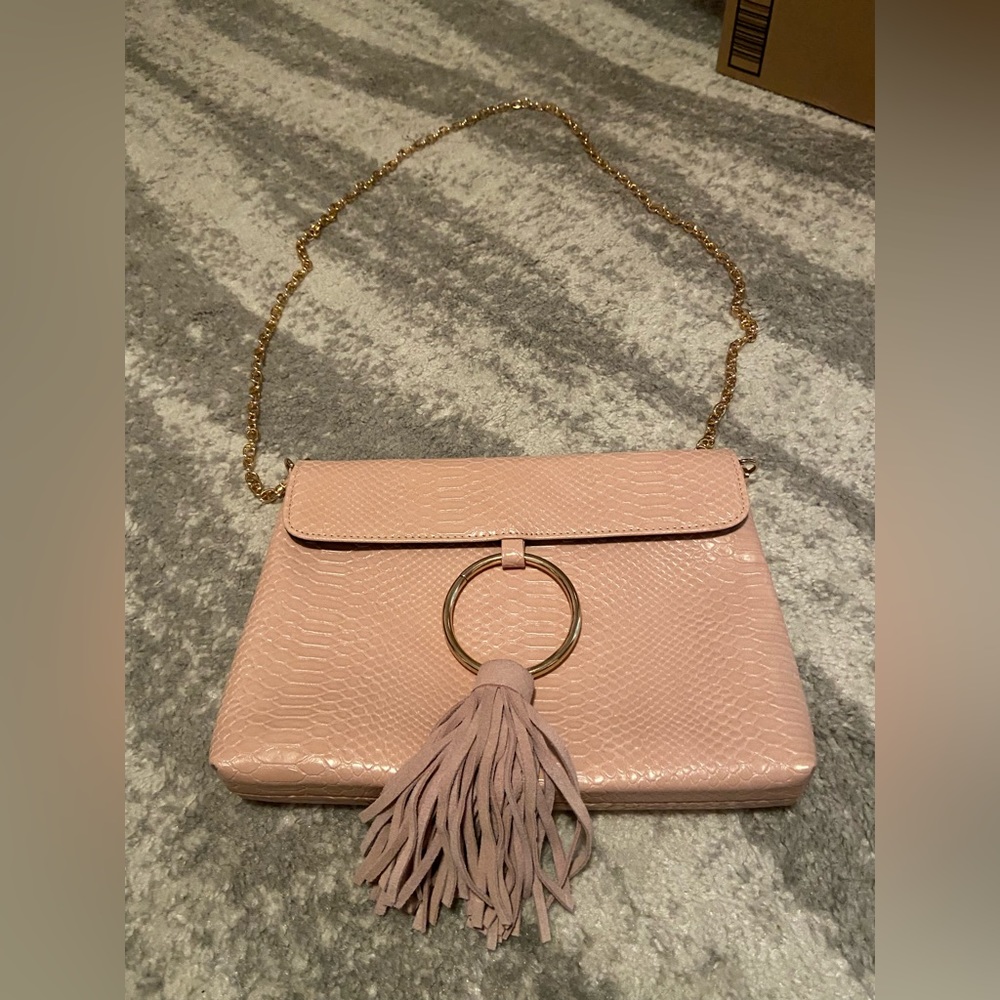 Anthro clutch with strap